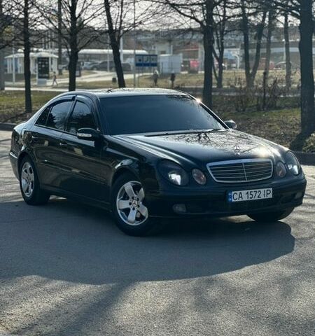 Черный Мерседес Е-Класс, объемом двигателя 2 л и пробегом 302 тыс. км за 5300 $, фото 1 на Automoto.ua