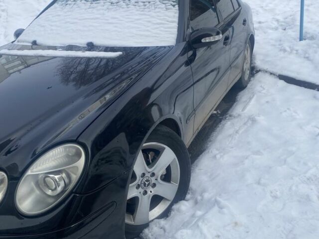 Чорний Мерседес Е-Клас, об'ємом двигуна 2.1 л та пробігом 270 тис. км за 6500 $, фото 1 на Automoto.ua