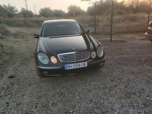 Черный Мерседес Е-Класс, объемом двигателя 2.6 л и пробегом 167 тыс. км за 6500 $, фото 1 на Automoto.ua