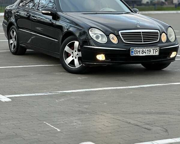 Черный Мерседес Е-Класс, объемом двигателя 3.2 л и пробегом 243 тыс. км за 4699 $, фото 1 на Automoto.ua
