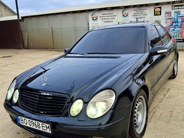 Черный Мерседес Е-Класс, объемом двигателя 2.1 л и пробегом 490 тыс. км за 5300 $, фото 1 на Automoto.ua