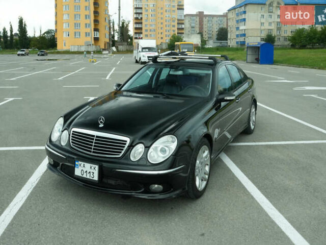Черный Мерседес Е-Класс, объемом двигателя 4.97 л и пробегом 300 тыс. км за 9300 $, фото 1 на Automoto.ua