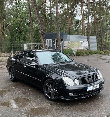Чорний Мерседес Е-Клас, об'ємом двигуна 4.97 л та пробігом 351 тис. км за 9000 $, фото 1 на Automoto.ua