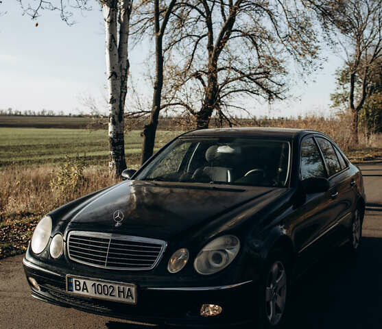 Чорний Мерседес Е-Клас, об'ємом двигуна 1.8 л та пробігом 221 тис. км за 6200 $, фото 1 на Automoto.ua