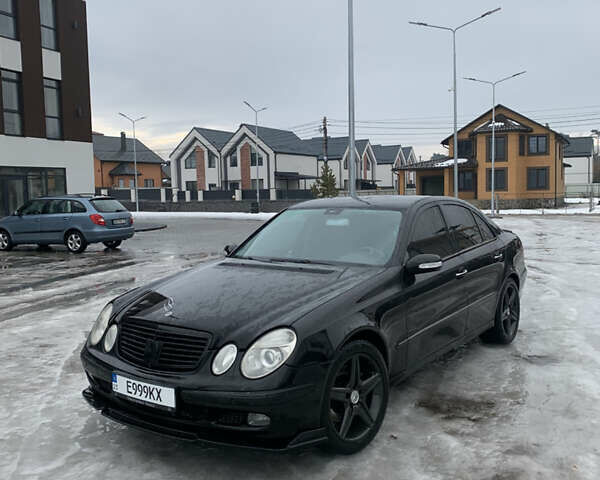 Чорний Мерседес Е-Клас, об'ємом двигуна 4.97 л та пробігом 352 тис. км за 9000 $, фото 1 на Automoto.ua