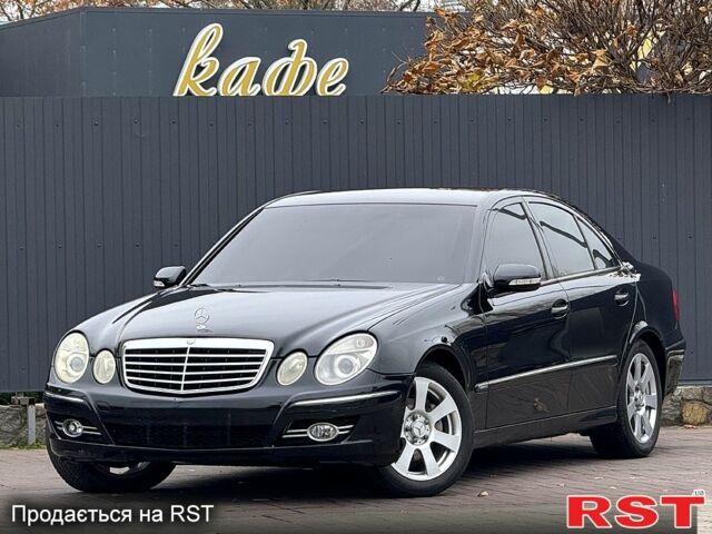 Черный Мерседес Е-Класс, объемом двигателя 1.8 л и пробегом 220 тыс. км за 5950 $, фото 1 на Automoto.ua