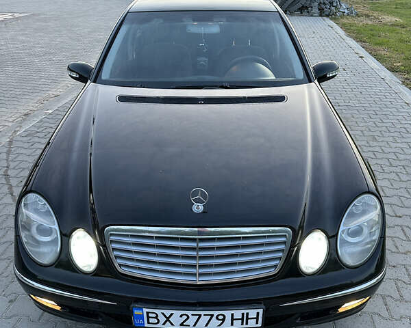 Мерседес Е-Класс 2003 в Дунаевцах на Automoto.ua Черный Мерседес Е-Класс, объемом двигателя 1.8 л и пробегом 265 тыс. км за 6400 $, фото 1 на Automoto.ua