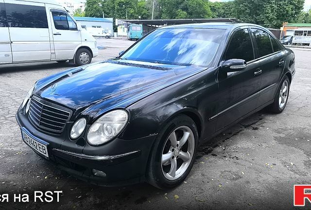 Черный Мерседес Е-Класс, объемом двигателя 1.8 л и пробегом 390 тыс. км за 6750 $, фото 1 на Automoto.ua