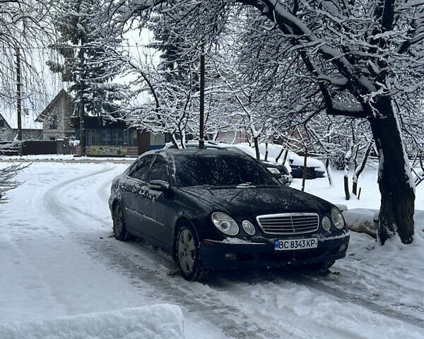 Черный Мерседес Е-Класс, объемом двигателя 3.2 л и пробегом 430 тыс. км за 6200 $, фото 1 на Automoto.ua