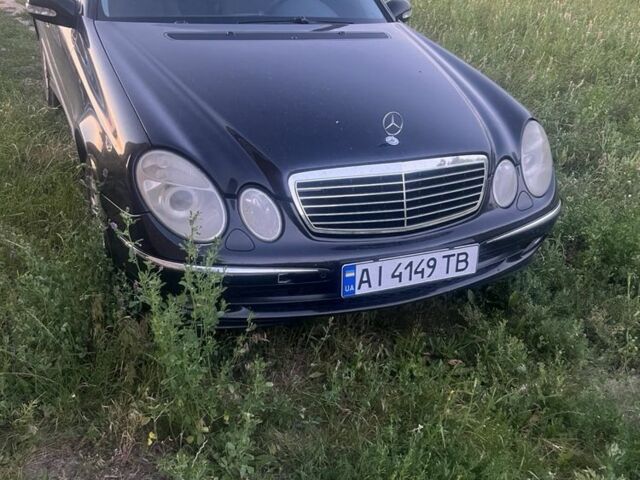 Черный Мерседес Е-Класс, объемом двигателя 2 л и пробегом 400 тыс. км за 4000 $, фото 1 на Automoto.ua