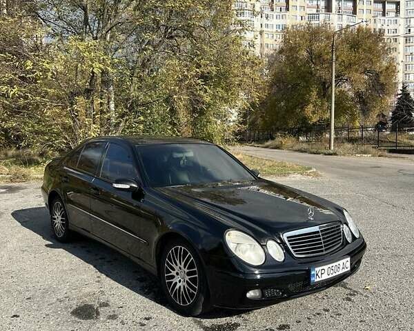 Черный Мерседес Е-Класс, объемом двигателя 2.6 л и пробегом 240 тыс. км за 5999 $, фото 1 на Automoto.ua