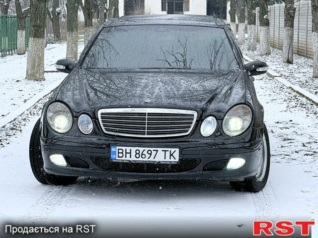Чорний Мерседес Е-Клас, об'ємом двигуна 2.1 л та пробігом 444 тис. км за 7500 $, фото 1 на Automoto.ua