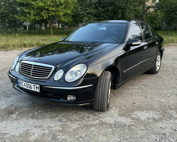 Черный Мерседес Е-Класс, объемом двигателя 2.6 л и пробегом 158 тыс. км за 8999 $, фото 1 на Automoto.ua