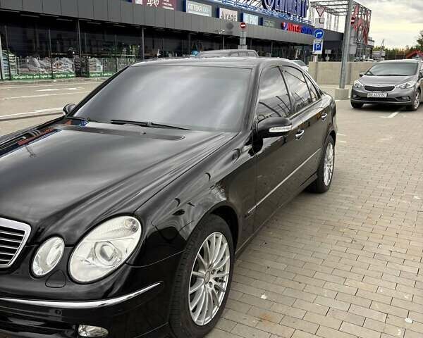 Черный Мерседес Е-Класс, объемом двигателя 4.97 л и пробегом 357 тыс. км за 10500 $, фото 1 на Automoto.ua