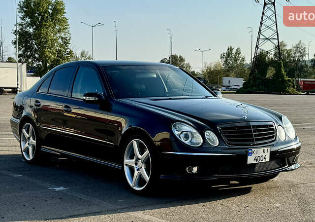 Черный Мерседес Е-Класс, объемом двигателя 5 л и пробегом 238 тыс. км за 12000 $, фото 1 на Automoto.ua