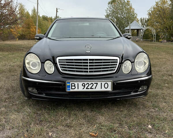Черный Мерседес Е-Класс, объемом двигателя 2 л и пробегом 355 тыс. км за 6200 $, фото 1 на Automoto.ua