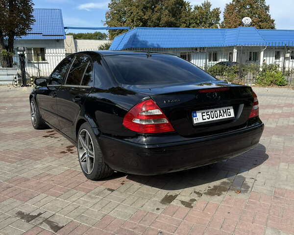 Черный Мерседес Е-Класс, объемом двигателя 4.97 л и пробегом 360 тыс. км за 10000 $, фото 1 на Automoto.ua
