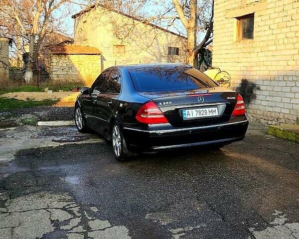Черный Мерседес Е-Класс, объемом двигателя 3.2 л и пробегом 36 тыс. км за 6000 $, фото 1 на Automoto.ua