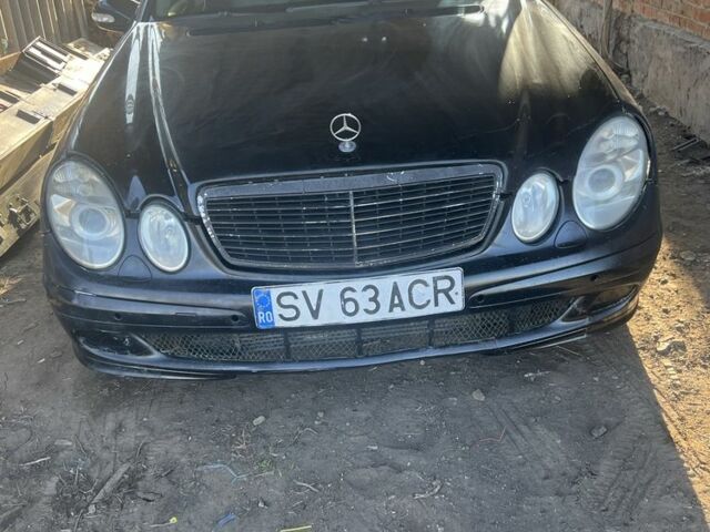 Чорний Мерседес Е-Клас, об'ємом двигуна 2.2 л та пробігом 328 тис. км за 2800 $, фото 1 на Automoto.ua