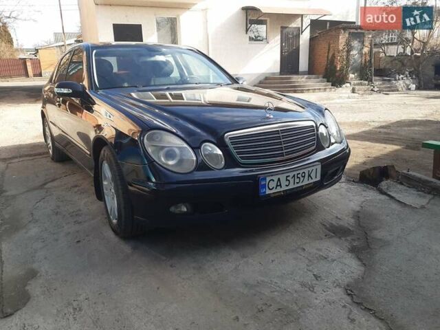 Черный Мерседес Е-Класс, объемом двигателя 1.8 л и пробегом 220 тыс. км за 8650 $, фото 1 на Automoto.ua