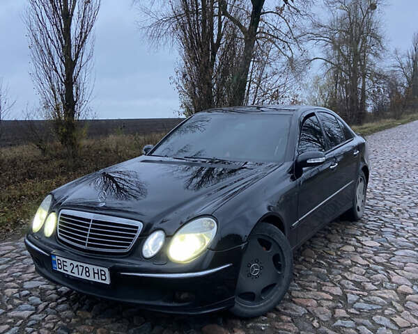 Черный Мерседес Е-Класс, объемом двигателя 2.6 л и пробегом 285 тыс. км за 5400 $, фото 1 на Automoto.ua