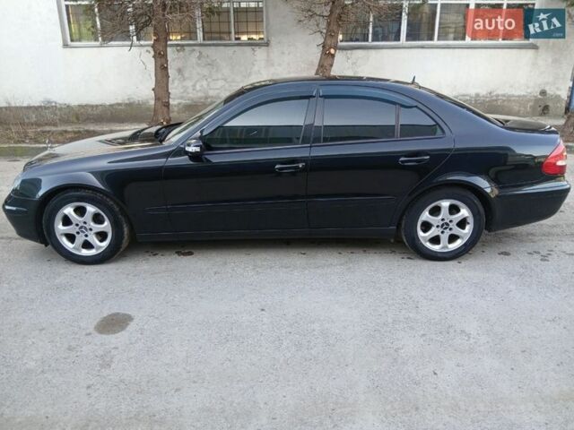 Черный Мерседес Е-Класс, объемом двигателя 2.2 л и пробегом 366 тыс. км за 8450 $, фото 1 на Automoto.ua