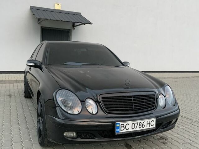 Чорний Мерседес Е-Клас, об'ємом двигуна 2 л та пробігом 375 тис. км за 5600 $, фото 1 на Automoto.ua