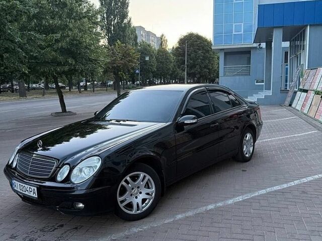 Чорний Мерседес Е-Клас, об'ємом двигуна 1.8 л та пробігом 450 тис. км за 5999 $, фото 1 на Automoto.ua