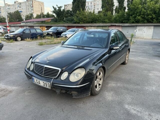Чорний Мерседес Е-Клас, об'ємом двигуна 3 л та пробігом 400 тис. км за 1149 $, фото 1 на Automoto.ua