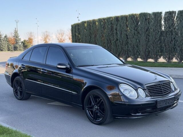 Чорний Мерседес Е-Клас, об'ємом двигуна 2 л та пробігом 200 тис. км за 6400 $, фото 1 на Automoto.ua