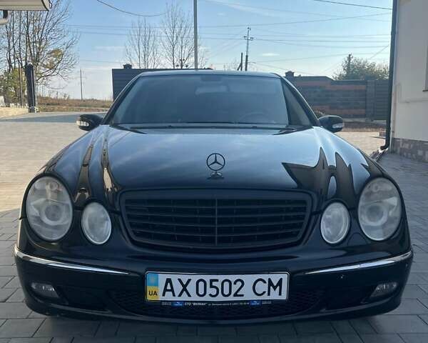 Мерседес Е-Клас 2005 у Рівному на Automoto.ua Чорний Мерседес Е-Клас, об'ємом двигуна 1.8 л та пробігом 255 тис. км за 5800 $, фото 1 на Automoto.ua