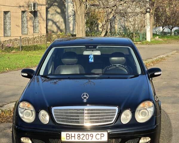 Черный Мерседес Е-Класс, объемом двигателя 1.8 л и пробегом 267 тыс. км за 6600 $, фото 1 на Automoto.ua