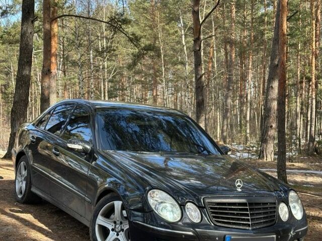 Черный Мерседес Е-Класс, объемом двигателя 3.2 л и пробегом 300 тыс. км за 3999 $, фото 1 на Automoto.ua