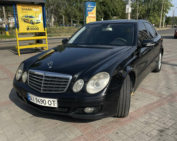 Черный Мерседес Е-Класс, объемом двигателя 3 л и пробегом 245 тыс. км за 9500 $, фото 1 на Automoto.ua
