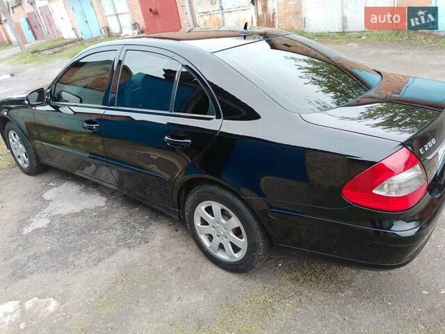 Черный Мерседес Е-Класс, объемом двигателя 1.8 л и пробегом 264 тыс. км за 8100 $, фото 1 на Automoto.ua