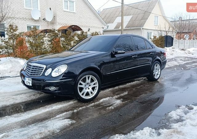 Черный Мерседес Е-Класс, объемом двигателя 3.5 л и пробегом 230 тыс. км за 7500 $, фото 1 на Automoto.ua