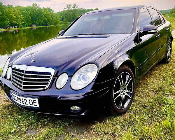 Чорний Мерседес Е-Клас, об'ємом двигуна 2.1 л та пробігом 315 тис. км за 9000 $, фото 1 на Automoto.ua