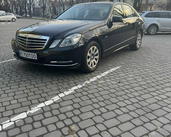 Черный Мерседес Е-Класс, объемом двигателя 3 л и пробегом 266 тыс. км за 14200 $, фото 1 на Automoto.ua