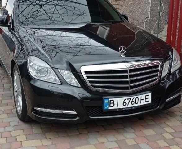 Черный Мерседес Е-Класс, объемом двигателя 2.1 л и пробегом 185 тыс. км за 12500 $, фото 1 на Automoto.ua