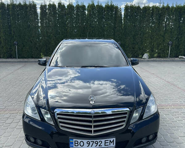 Черный Мерседес Е-Класс, объемом двигателя 2.14 л и пробегом 210 тыс. км за 13200 $, фото 1 на Automoto.ua