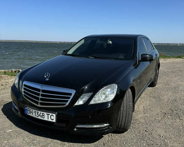 Черный Мерседес Е-Класс, объемом двигателя 1.8 л и пробегом 190 тыс. км за 13500 $, фото 1 на Automoto.ua