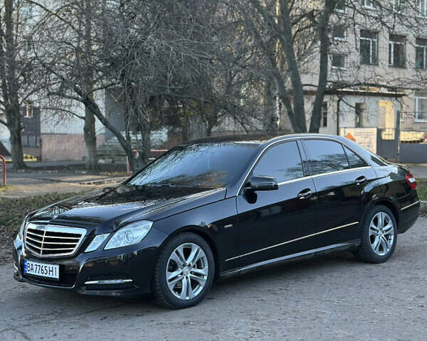 Черный Мерседес Е-Класс, объемом двигателя 2.2 л и пробегом 299 тыс. км за 14000 $, фото 1 на Automoto.ua