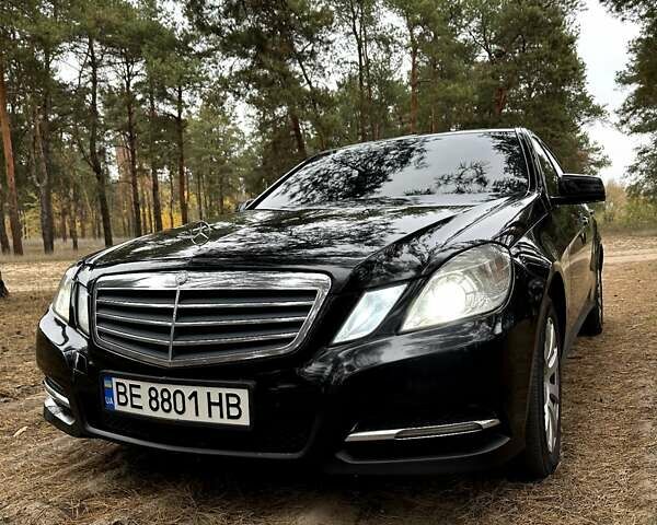 Черный Мерседес Е-Класс, объемом двигателя 2.2 л и пробегом 311 тыс. км за 11999 $, фото 1 на Automoto.ua