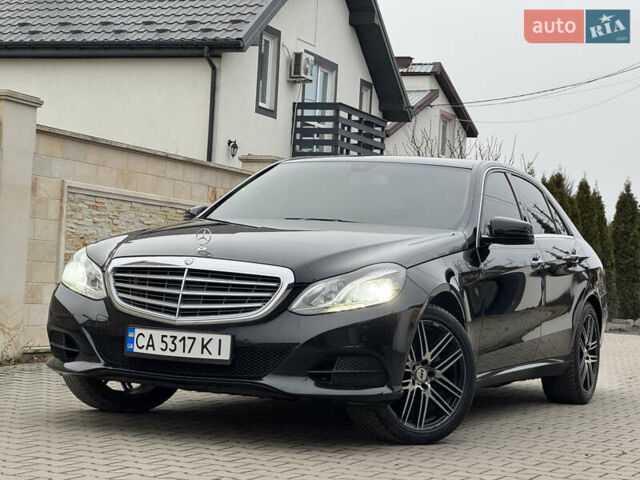 Чорний Мерседес Е-Клас, об'ємом двигуна 2 л та пробігом 329 тис. км за 13600 $, фото 1 на Automoto.ua