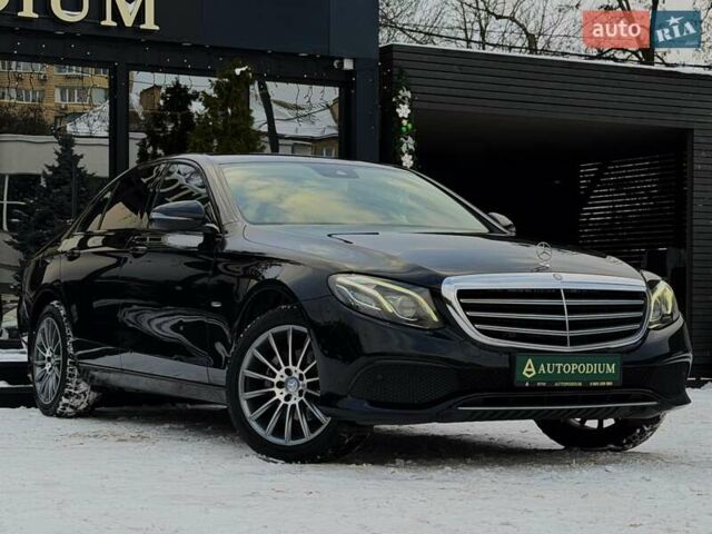 Черный Мерседес Е-Класс, объемом двигателя 1.95 л и пробегом 186 тыс. км за 24900 $, фото 1 на Automoto.ua