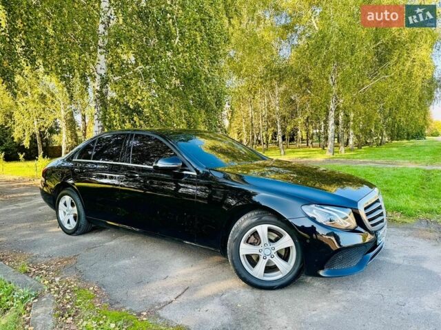Чорний Мерседес Е-Клас, об'ємом двигуна 2 л та пробігом 61 тис. км за 28500 $, фото 1 на Automoto.ua