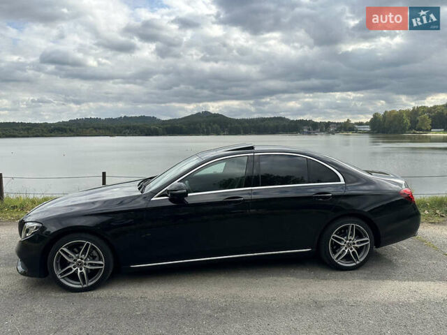 Черный Мерседес Е-Класс, объемом двигателя 2 л и пробегом 186 тыс. км за 30521 $, фото 1 на Automoto.ua