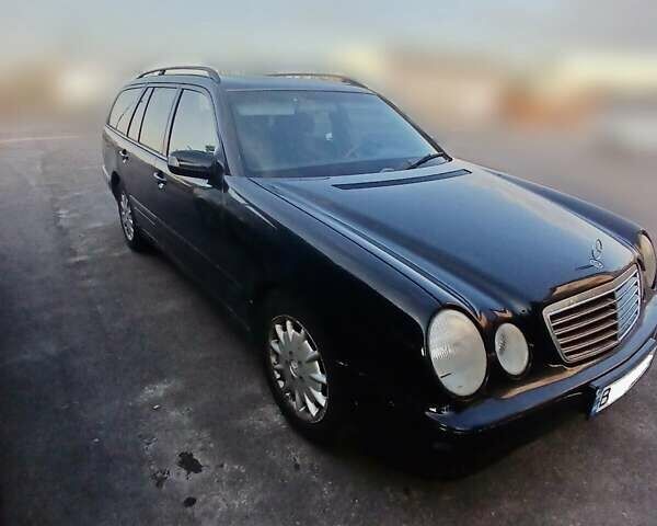 Чорний Мерседес Е-Клас, об'ємом двигуна 2 л та пробігом 450 тис. км за 2800 $, фото 1 на Automoto.ua