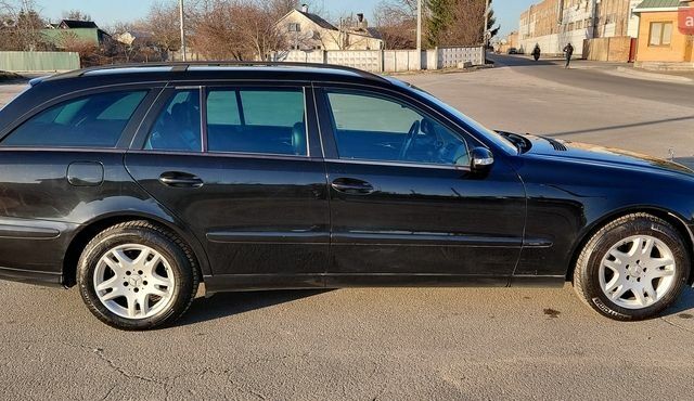 Черный Мерседес Е-Класс, объемом двигателя 1.8 л и пробегом 280 тыс. км за 5999 $, фото 1 на Automoto.ua