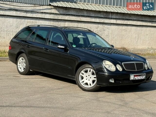 Черный Мерседес Е-Класс, объемом двигателя 1.8 л и пробегом 280 тыс. км за 5699 $, фото 1 на Automoto.ua